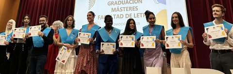 Master's graduates receive diplomas